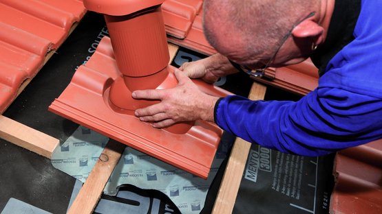 3. Poser la bouche d’aération avec la manchette