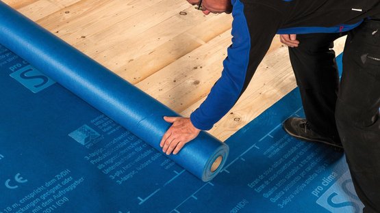 2b. Pose de la membrane et chevauchement des lés