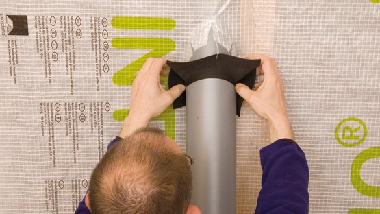 1. Mise en place et ajustement de la manchette sur le conduit