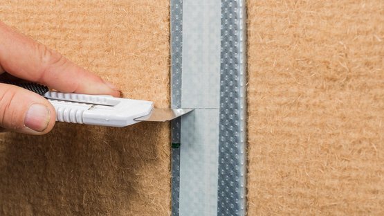 2. Séparer le papier transfert au cutter