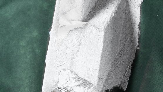 23. Recouvrir le non-tissé de produit